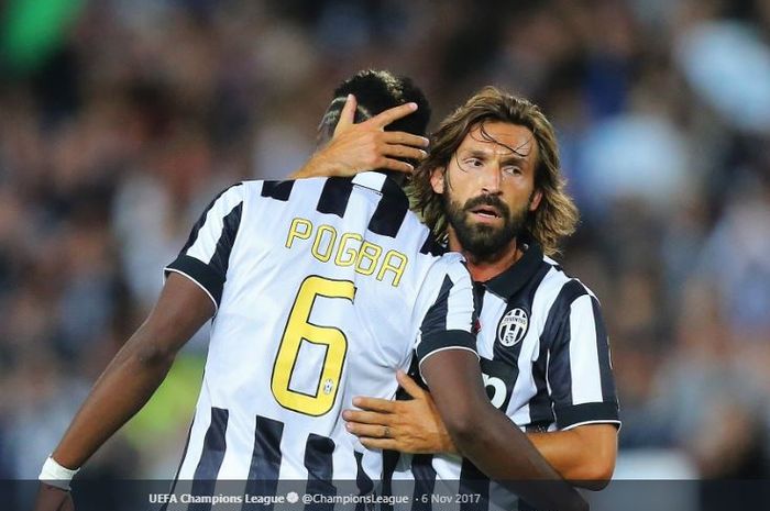 Paul Pogba dan Andrea Pirlo berpelukan saat memperkuat Juventus.