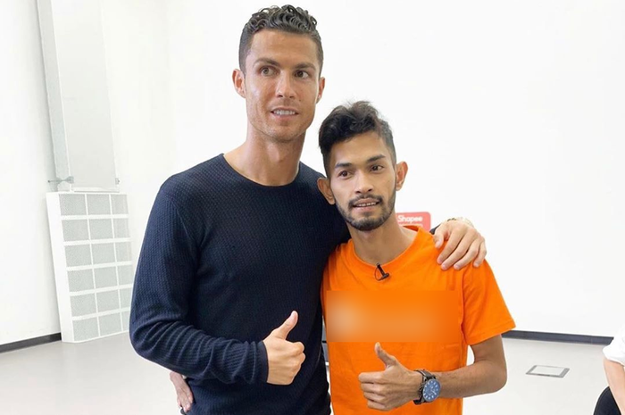 Cristiano Ronaldo dan anak angkatnya, Martunis