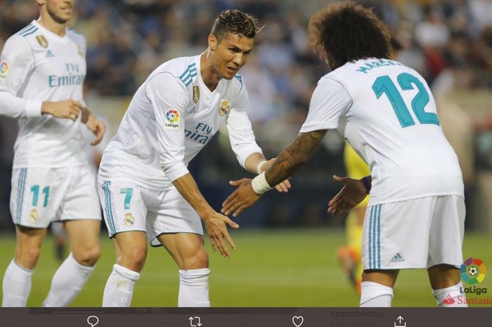 Gareth Bale (kiri), Cristiano Ronaldo (tengah), dan Marcelo membela Real Madrid saat melawan Villareal.