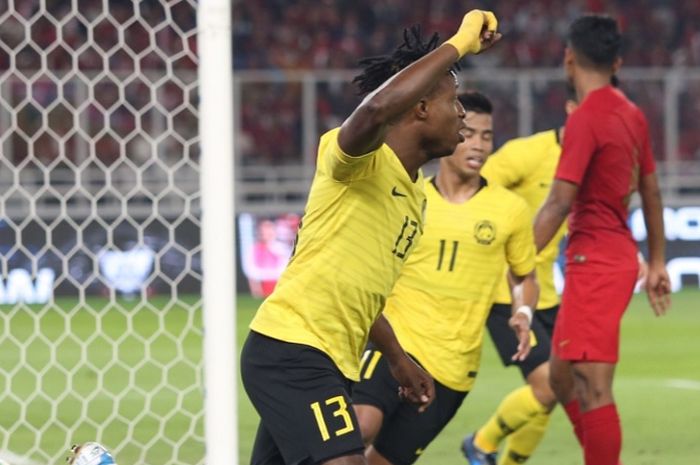 Momen saat pemain Malaysia, Mohamadou Sumareh (#13), merayakan golnya ke gawang Indonesia dalam laga kualifikasi Piala Dunia 2022 Zona Asia, Kamis (5/9/2019).