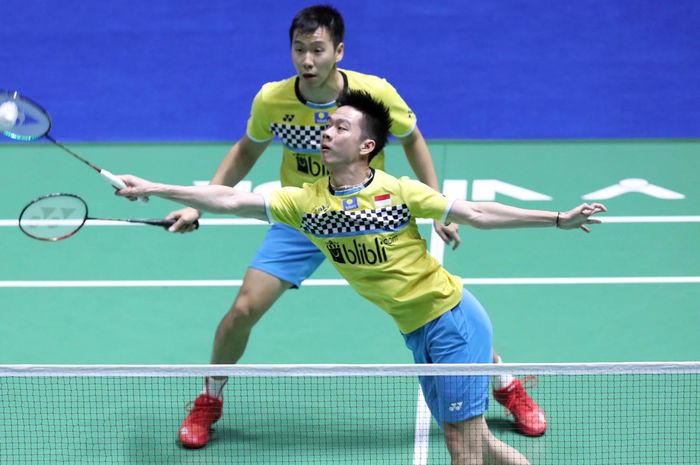Aksi ganda putra Indonesia, Marcus Fernaldi Gideon/Kevin Sanjaya Sukamuljo, dalam ajang China Open 2019