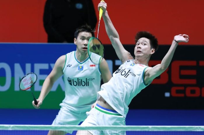 Pasangan ganda putra Indonesia, Marcus Fernaldi Gideon/Kevin Sanjaya Sukamuljo, pada perempat final All England Open 2020 di Arena Birmingham, Inggris, Jumat (13/3/2020).