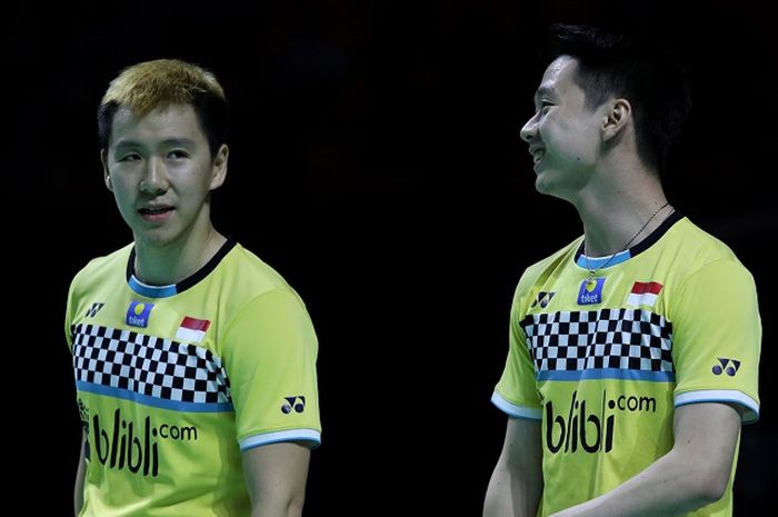 Ekspresi Marcus Gideon (kiri) dan Kevin Sanjaya (kanan) saat tampil pada fase semifinal Fuzhou China Open 2019 pada Sabtu (9/11/2019)