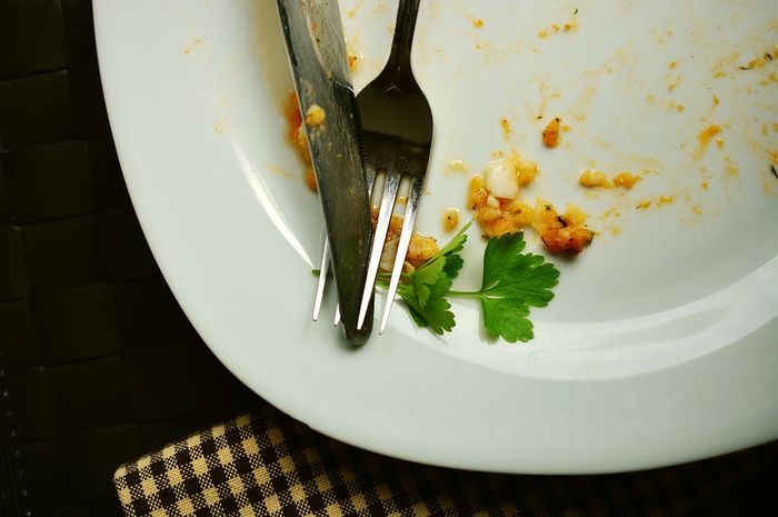 Ilustrasi sisa makanan di piring.