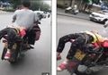 (Video) Duh, Seorang Ayah Antar Putrinya ke Sekolah Dengan Cara Diikat di Jok Motor