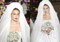 Gigi Hadid Tampil dengan Koleksi Busana Pengantin dari Moschino di Milan Fashion Week 2019