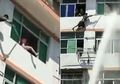 Tak Lazim, Petugas Pemadam Kebakaran Semprot Air untuk Cegah Seorang Wanita Bunuh Diri