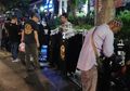 Kelar Konser Guns N' Roses, Penjual Merchandise Palsu Bermunculan di Senayan