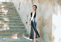 Menawan, Yuk Contek Gaya Pamela Bowie Bermain dengan Midi Dress