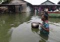 Deretan Foto Senyum Pilu Para Pengungsi Banjir Bandang Sentani