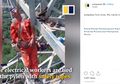 Hanya Gunakan Seutas Tali, Video Para Pekerja Listrik Tidur Siang di Ketinggian 50 Meter Jadi Viral