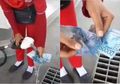 Viral Pembuktian Uang Palsu Rp50 Ribu dengan Disiram Bensin, Begini Tanggapan Pihak Bank Indonesia