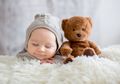 Mengapa Bayi Sering Tersenyum Atau Tertawa Saat Tidur?