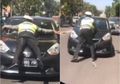 Fakta Seputar Video Viral Polisi Menempel di Kap Mobil yang Melaju Seperti di Film Action