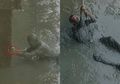 Seorang Pria Nekat Terjun Ke Laut Berlumpur Demi Sebuah Meteran, Ada Kisah Haru di Baliknya