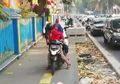 Viral! Video Cekcok antara Pejalan Kaki dan Pengendara Motor di Trotoar