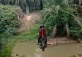 Daripada Memutar Sejauh 18 Kilometer, Berikut Fakta Seputar 'Motor Flying Fox' yang Seberangi Sungai Selebar 14 Meter