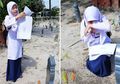 Bikin Netizen Banjir Air Mata, Beredar Foto Anak SD Nangis di Makam Ibunya sambil Bawa Hasil Kelulusan