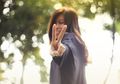 Berfoto dengan Pose 'Peace' Itu Berbahaya, Ini Penjelasan Kepolisian Malaysia