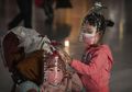 Berita Virus Corona Terkini: Saking Takutnya Terinfeksi Corona, Masker Galon Dan Buah-Buahan Jadi Trend Di China