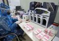 Takut Virus Corona, Wanita Tiongkok Panaskan Uang Rp 6,5 Juta di Microwave, Namun Kini Nasibnya Malah Apes