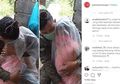 Rindu Tak Terbendung, Sang Ayah Sebagai Garda Terdepan Covid-19 Nekat Peluk Anaknya dengan Cara Ini