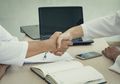 Jelang Akhir Ramadhan, Bolehkah Jabat Tangan saat Bayar Zakat di Tengah Pandemi Corona?