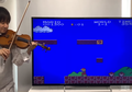 Pemain Biola Unjuk Skill Tingkat Dewa Nge-cover Soundtrack Super Mario Bros