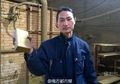 Seniman China Ini Membuat Batu Bata dari Asap Beijing yang Dikumpulkan Menggunakan Vacum Cleaner