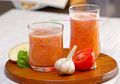 Minuman Penurun Kolesterol: Segelas Campuran Tomat dan Bawang Putih
