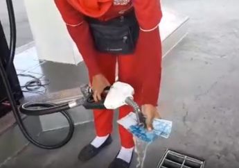 Viral! Petugas SPBU Siram Uang Rp 50 Ribu dengan Bensin untuk Buktikan Keaslian, BI Beri Penjelasan
