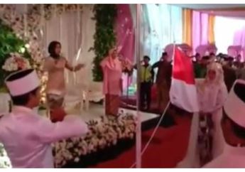 Viral, Pengantin di Kebumen Gelar Upacara Bendera Saat Resepsi Pernikahannya