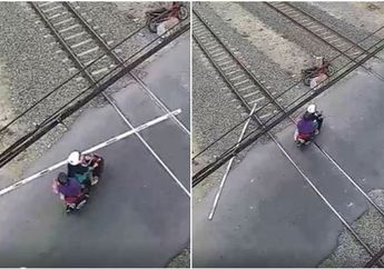 Viral! Emak-emak Naik Motor Terobos Palang Kereta Api Sampai Copot, dengan Santainya Nyelonong Pergi