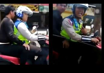 Oknum Polisi Kepergok Main Handphone Saat Berkendara Motor, Ini Alasannya Ketika Ditegur Pengendara Lain