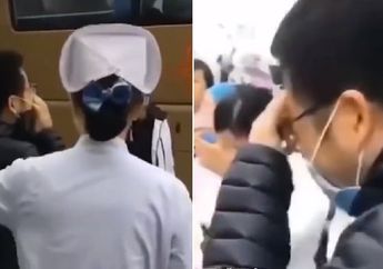Berlinang Air Mata, Pria Ini Lepas Kepergian Istrinya yang Naik Bus ke Wuhan untuk Jadi Relawan 'Perangi' Virus Corona