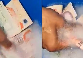 Video Viral, Seorang Pria Singapura Cuci Uangnya agar Terhindar dari Virus Corona