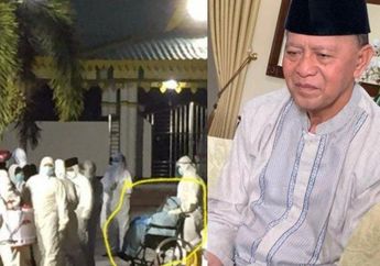 Duduk Lemas di Kursi Roda Lengkap dengan Pakaian Hazmat, Istri Mendiang Wali Kota Tanjung Pinang Antarkan Sang Suami ke Peristirahatan Terakhirnya