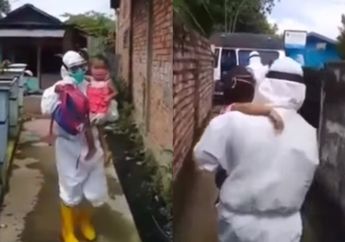 Menyayat Hati, Bocah Perempuan 2 Tahun Ini Hanya Diam Tak Menangis Meski Dinyatakan Positif Corona hingga Harus Jalani Karantina Sendirian Tanpa Orang Tua
