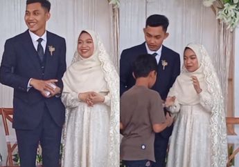 Viral Video Pasangan Pengantin Memberikan Amplop untuk Anak Yatim, Netizen: Inspirasi Banget!