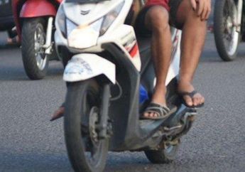 Benarkah Pakai Sandal Saat Mengendarai Sepeda Motor Akan Ditilangt Polisi?