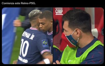 Lionel Messi menonton rekan satu timnya  dari bangku cadangan dalam laga kontra Reims di pekan keempat Liga Prancis.