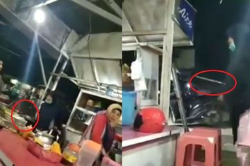 Emak-emak ini emosi dan nekat menenteng golok mengejar pria yang diduga suaminya.