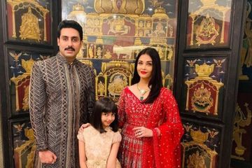 Abhishek Bachchan bersama istri dan anaknya