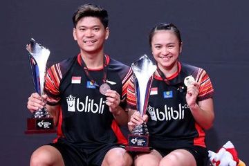 Atlet badminton ganda campuran Praveen Jordan dan Melati Daeva Oktavianti. Praveen mundur karena terkena saraf kejepit.