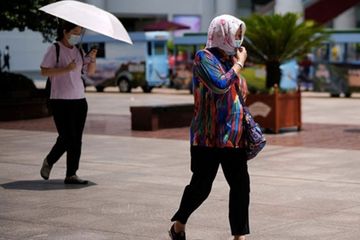 Gelombang Panas Hantam China Hingga Jalanan Melengkung, Ini Efeknya Bagi Kesehatan