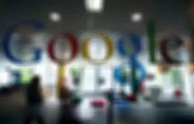 A Google Inc member of staff walks through the company headquarters in London, U.K., on Wednesday, Aug. 18, 2010. The German government will create a legal framework for consumer data protection in the Internet this year, reacting to a debate about the introduction of Google Inc.'s Street View service. Photographer: Simon Dawson/Bloomberg via Getty Images