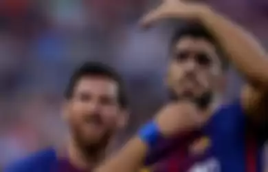 Lionel Messi dan Luis Suarez
