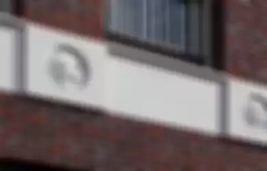 Gedung di Belanda yang menggunakan 22 emoji pada fasadnya
