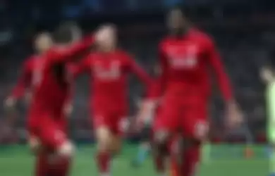 Para pemain Liverpool merayakan gol Divock Origi dalam leg kedua semifinal Liga Champions kontra Barcelona di Stadion Anfield, 7 Mei 2019.