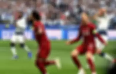 Penyerang Liverpool, Mohamed Salah, merayakan gol ke gawang Tottenham Hotspur dalam laga final Liga Champions di Stadion Wanda Metropolitano, Sabtu (1/6/2019).